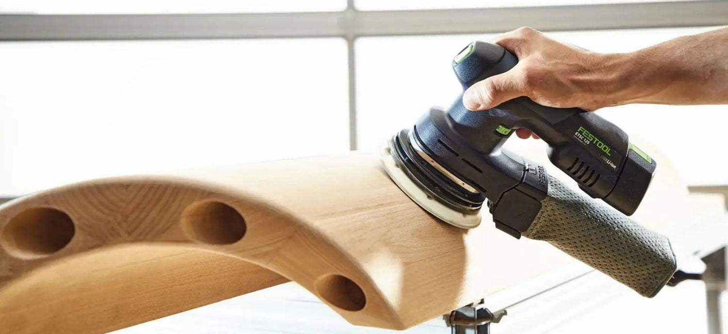 festool sander in use on wood