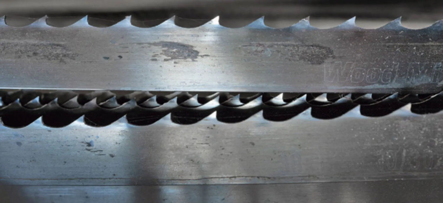 close up of bandsaw blade teeth