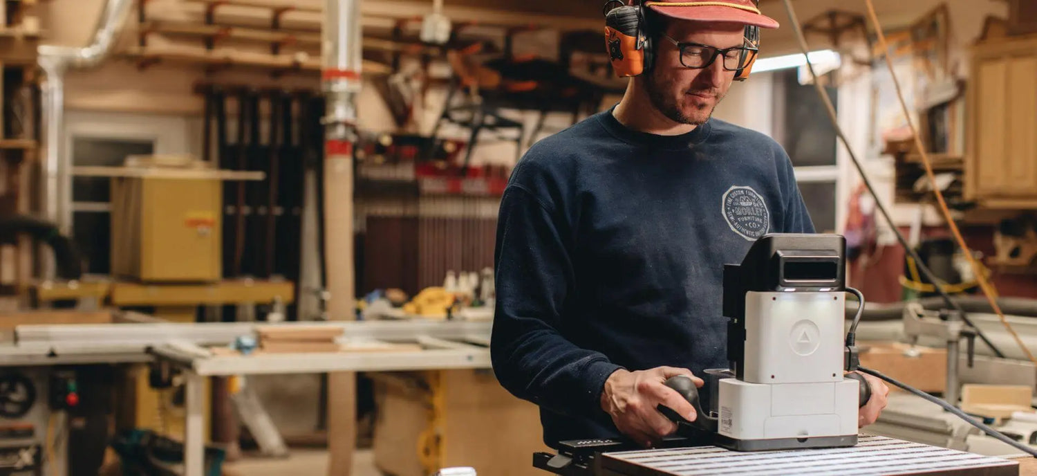 man using Shaper Tools Origin Router