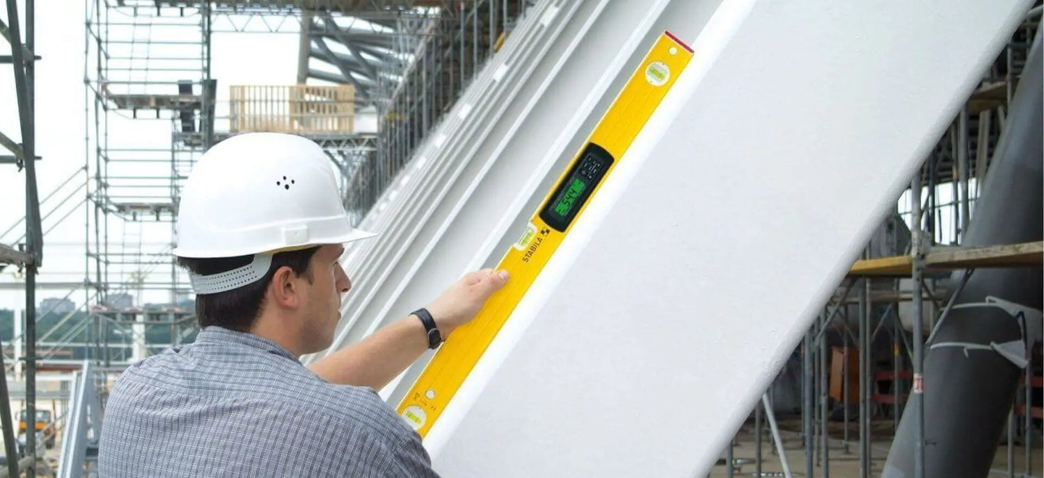 man using a stabila level