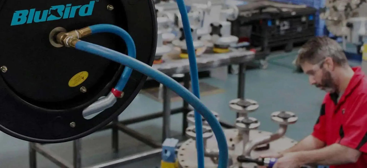 Blubird hose reel in use