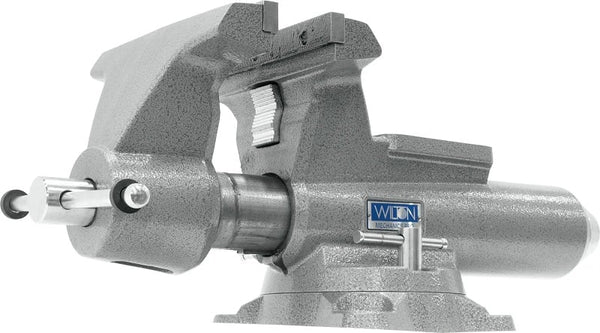 Gray metal bench vise with rotating base, T handle, and Wilton label.