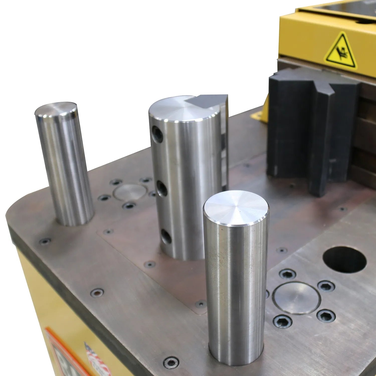 Close up of the HPB-20 bending press top surface showing vertical cylindrical posts and tooling mounts