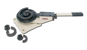 Baileigh MPB-10 manual scroll bender with round die head and four removable dies nearby