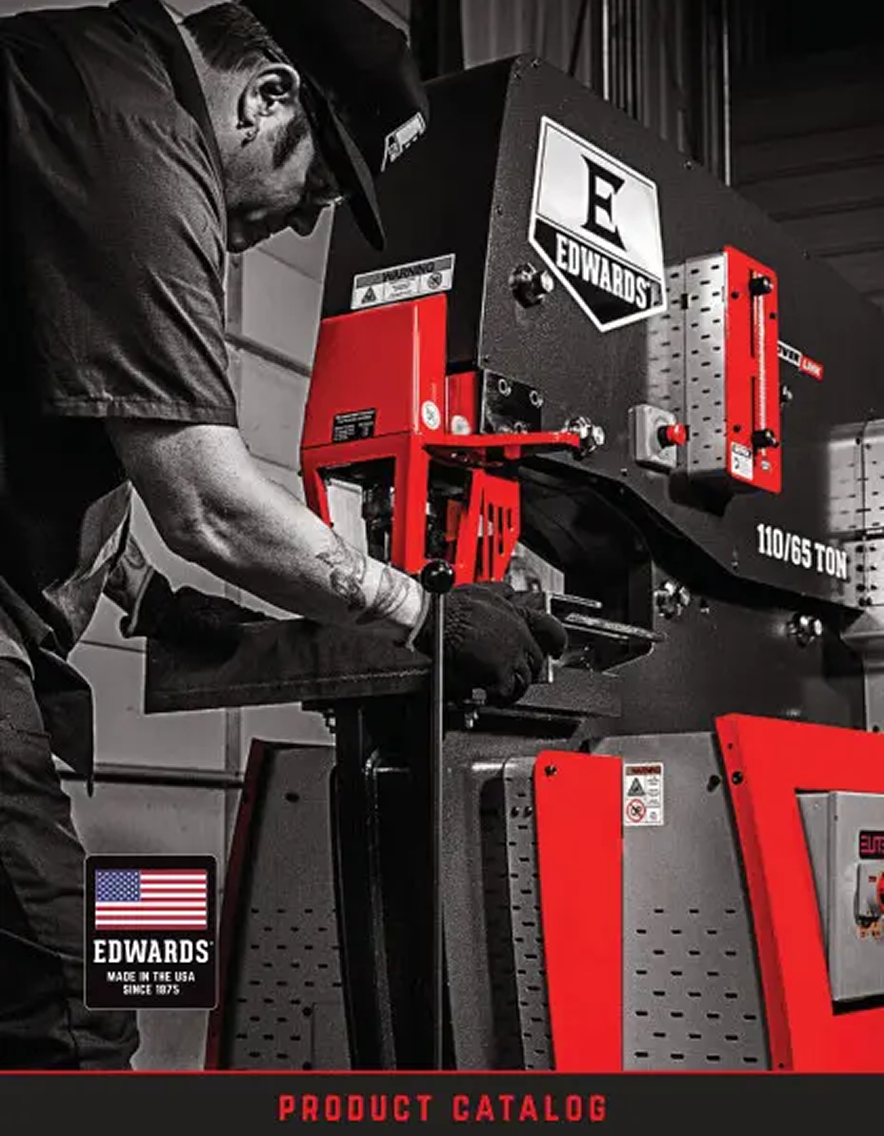Person operating a large industrial machine with 'Edwards' branding, featuring a product catalog text.