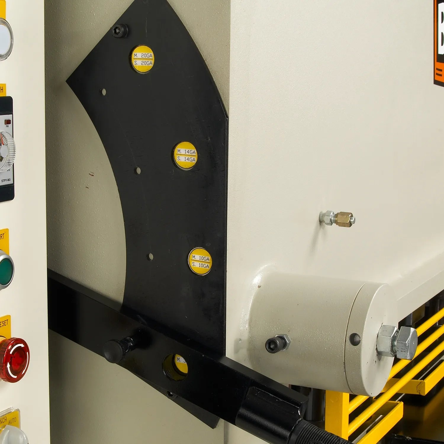 Side view of Baileigh SH-8010-HD 80 in hydraulic sheet metal shear showing a black frame panel with yellow safety decals.