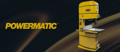 Yellow band saw with Powermatic branding on a dark background