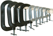 Row of Bessey CM22 drop forged C clamps clamped to a wooden rail showing black and galvanized finishes.