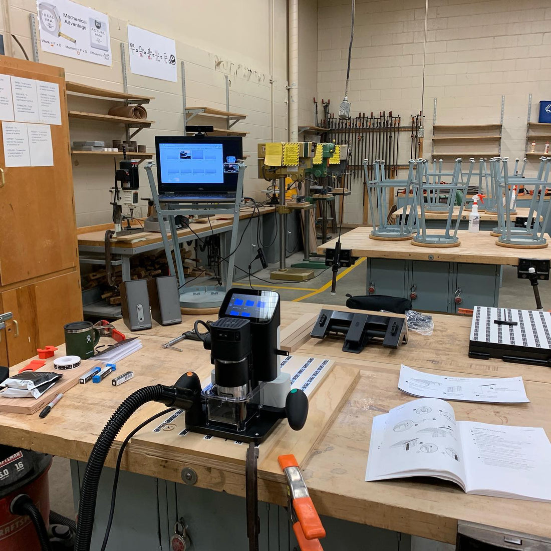 Woodworking workshop with tools and equipment on a table