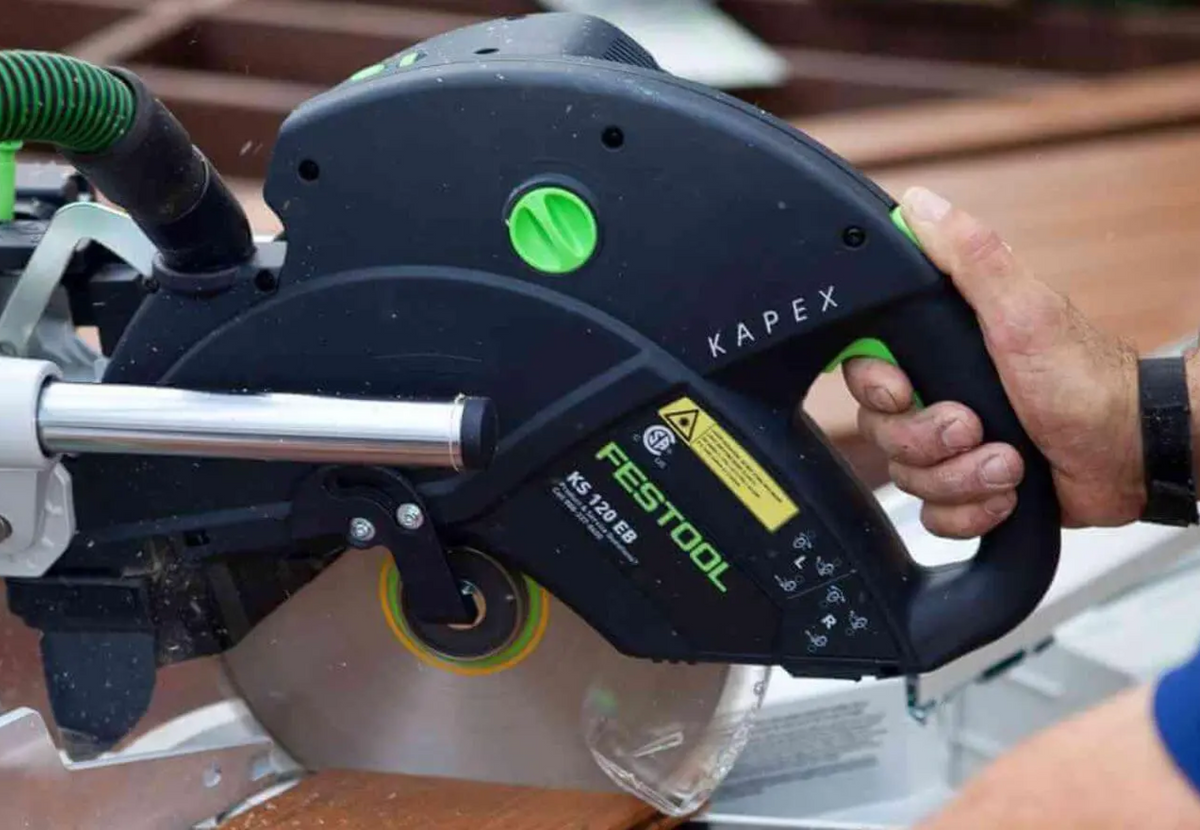 Festool circular saw, Kapex, being used by a person with visible branding.