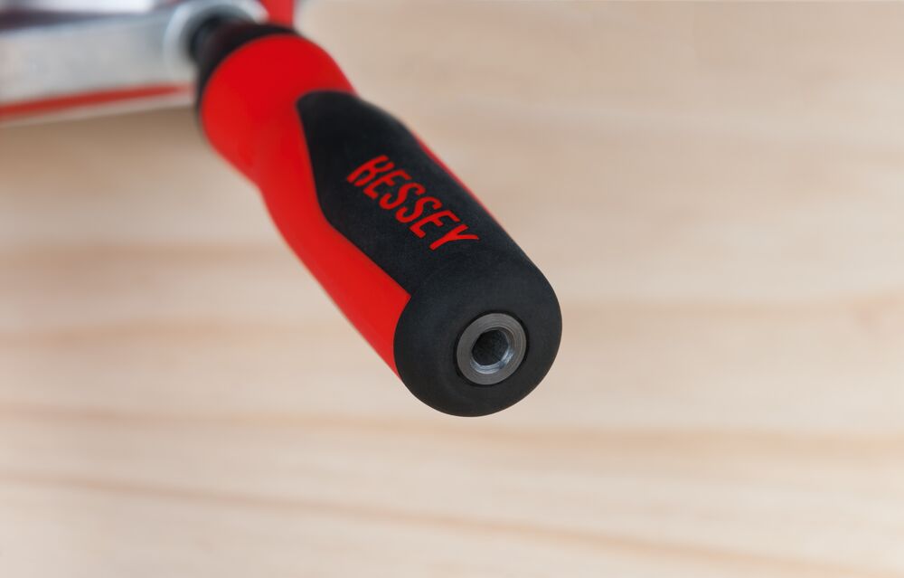 Close-up of red Bessey handle with black rubber overlay and visible Bessey logo.