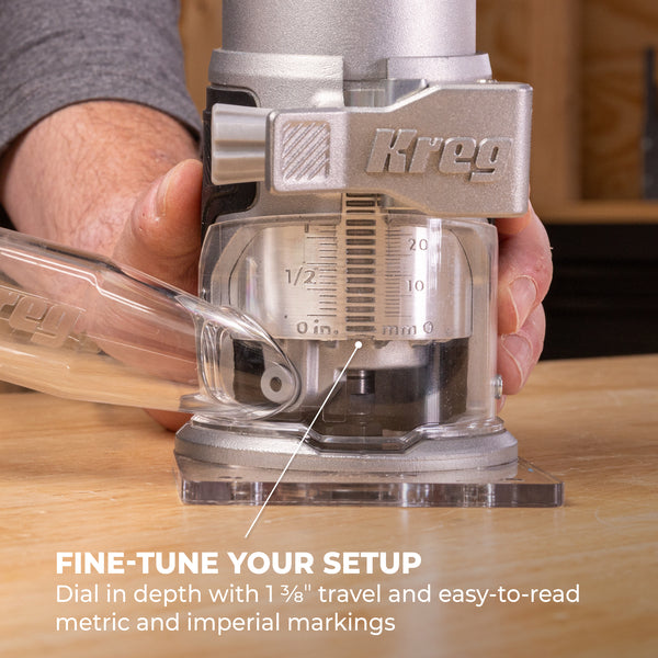 Close-up of the Kreg trim router base with depth adjustment dial and clear base with measurement markings.