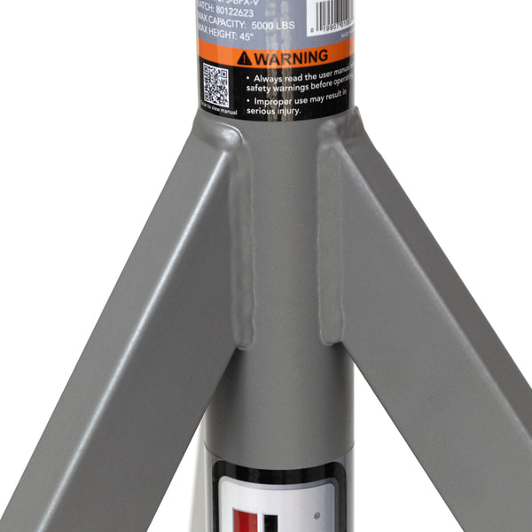 Close up of a Jet heavy duty fixed pipe jack stand base with wide V-shaped legs and a warning label on the central post