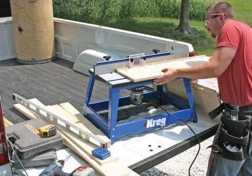 Man working with the Kreg Precision Benchtop Router Table