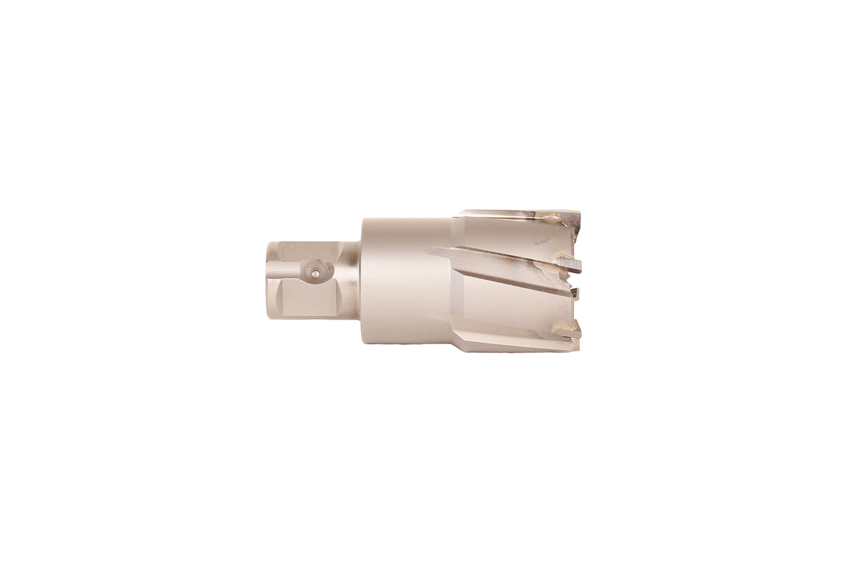 Side view of a carbide tipped annular cutter showing cutting flutes and worn surfaces